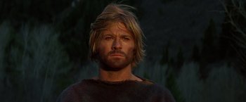 Movie still from “Jeremiah Johnson” (1972), directed by Sydney Pollack – A person with long hair and a beard; Close Up shot, Low angle