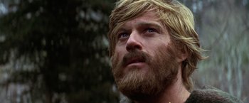 Movie still from “Jeremiah Johnson” (1972), directed by Sydney Pollack – A person with a beard; Close Up shot, Low angle