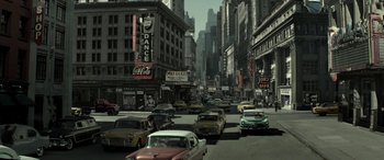 Movie still from “Jersey Boys” (2014), directed by Clint Eastwood – A city street filled with lots of traffic; Extreme Wide shot, High angle