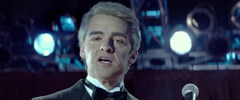 Movie still from “Jersey Boys” (2014), directed by Clint Eastwood – A person wearing a suit and a bow tie; Close Up shot, Low angle