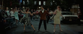 Movie still from “Jersey Boys” (2014), directed by Clint Eastwood – A group of young people dancing in a crowd; Wide shot, High angle