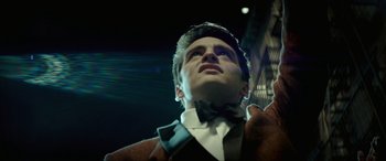 Movie still from “Jersey Boys” (2014), directed by Clint Eastwood – A man in a suit and bow tie looking up; Close Up shot, Low angle