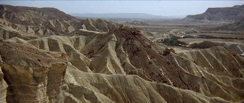 Movie still from “Jesus Christ Superstar” (1973), directed by Norman Jewison – A view of a mountain range with a valley in the background; Extreme Wide shot, High angle