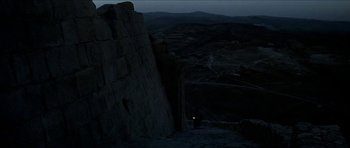 Movie still from “Jesus Christ Superstar” (1973), directed by Norman Jewison – A person standing on top of a mountain at night; Extreme Wide shot, High angle