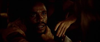 Movie still from “Jesus Christ Superstar” (1973), directed by Norman Jewison – A person with a hand on his shoulder; Close Up shot, High angle