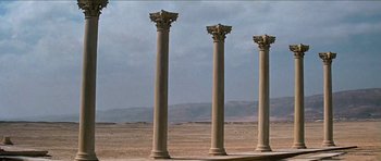 Movie still from “Jesus Christ Superstar” (1973), directed by Norman Jewison – A group of pillars in the middle of a desert; Extreme Wide shot, Low angle