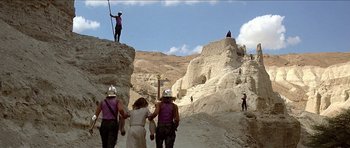 Movie still from “Jesus Christ Superstar” (1973), directed by Norman Jewison – A group of people standing on top of a rock formation; Extreme Wide shot, Low angle