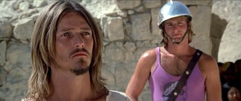 Movie still from “Jesus Christ Superstar” (1973), directed by Norman Jewison – A man with long hair wearing a helmet; Close Up shot, Low angle