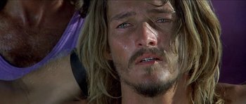 Movie still from “Jesus Christ Superstar” (1973), directed by Norman Jewison – A person with long hair and a beard; Close Up shot, Low angle