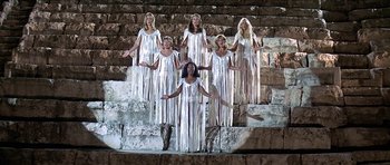 Movie still from “Jesus Christ Superstar” (1973), directed by Norman Jewison – A group of women standing next to each other on steps; Wide shot, High angle