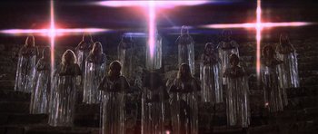 Movie still from “Jesus Christ Superstar” (1973), directed by Norman Jewison – A group of women standing next to each other; Wide shot, Low angle