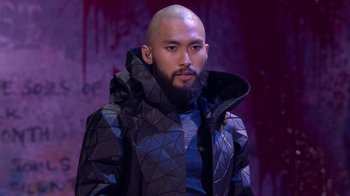 Movie still from “Jesus Christ Superstar Live in Concert” (2018), directed by Alex Rudzinski – A man with a bald head and a beard; Close Up shot, High angle