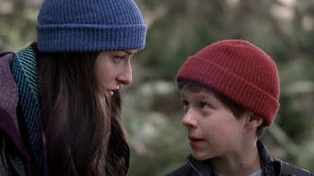 Movie still from “Turkey Hollow” (2015), directed by Kirk R. Thatcher – Two young people are looking at one another; Close Up shot, Over the shoulder angle