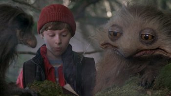 Movie still from “Turkey Hollow” (2015), directed by Kirk R. Thatcher – A young boy is looking at a monster; Close Up shot, Over the shoulder angle