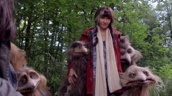 Movie still from “Turkey Hollow” (2015), directed by Kirk R. Thatcher – A woman standing in front of a group of birds; Medium shot, Low angle