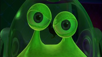 Movie still from “Jimmy Neutron: Boy Genius” (2001), directed by John A. Davis – A green monster with two eyes and a mouth; Close Up shot, Low angle