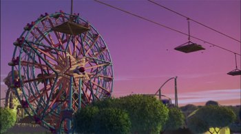Movie still from “Jimmy Neutron: Boy Genius” (2001), directed by John A. Davis – A view of a ferris wheel with a purple sky in the background; Extreme Wide shot, Low angle