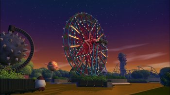 Movie still from “Jimmy Neutron: Boy Genius” (2001), directed by John A. Davis – An amusement park with a ferris wheel in the middle of the night; Extreme Wide shot, High angle