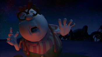 Movie still from “Jimmy Neutron: Boy Genius” (2001), directed by John A. Davis – An image of an animated character in the dark; Medium shot, High angle