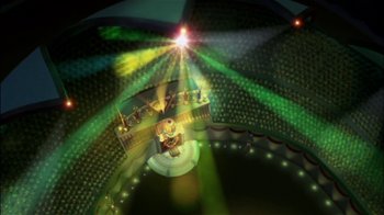 Movie still from “Jimmy Neutron: Boy Genius” (2001), directed by John A. Davis – An aerial view of a stage with lights and people; Extreme Wide shot, High angle