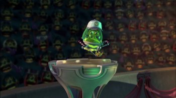 Movie still from “Jimmy Neutron: Boy Genius” (2001), directed by John A. Davis – A green character is sitting on top of a bowl; Wide shot, Low angle