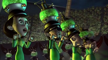 Movie still from “Jimmy Neutron: Boy Genius” (2001), directed by John A. Davis – A group of people in a field with green lights on their heads; Medium shot, Low angle