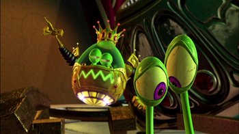 Movie still from “Jimmy Neutron: Boy Genius” (2001), directed by John A. Davis – A green character with a crown and a scepter in front of it; Medium shot, Low angle
