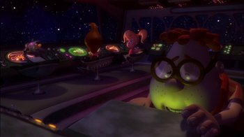 Movie still from “Jimmy Neutron: Boy Genius” (2001), directed by John A. Davis – A scene from a cartoon where a person is sitting at a table; Wide shot, High angle