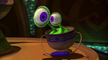 Movie still from “Jimmy Neutron: Boy Genius” (2001), directed by John A. Davis – A bowl with two eyes in it sitting on top of a wooden table; Close Up shot, High angle