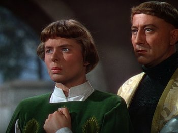 Movie still from “Joan of Arc” (1948), directed by Victor Fleming – A man and a woman standing next to each other; Close Up shot, Low angle