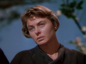 Movie still from “Joan of Arc” (1948), directed by Victor Fleming – A person with short brown hair; Close Up shot, Low angle