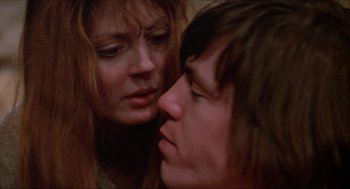 Movie still from “Joe” (1970), directed by John G. Avildsen – A woman and a young man face to face; Close Up shot, Low angle