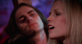 Movie still from “Joe” (1970), directed by John G. Avildsen – A man and a woman are looking at each other; Close Up shot, Low angle