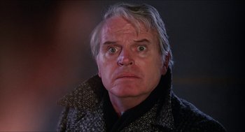 Movie still from “Joe” (1970), directed by John G. Avildsen – An older man with a surprised look on his face; Close Up shot, Low angle