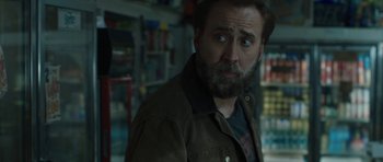 Movie still from “Joe” (2013), directed by David Gordon Green – A person with a beard; Close Up shot, Over the shoulder angle