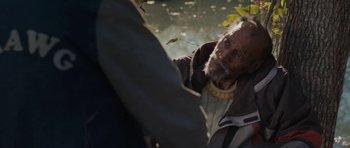Movie still from “Joe” (2013), directed by David Gordon Green – An old man with a beard is looking at the camera; Close Up shot, Over the shoulder angle