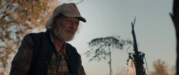 Movie still from “Joe” (2013), directed by David Gordon Green – An old man with a beard wearing a hat; Close Up shot, Low angle