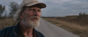Movie still from “Joe” (2013), directed by David Gordon Green – An old man with a beard wearing a hat; Close Up shot, Low angle