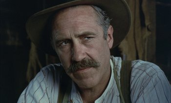 Movie still from “Johnny Got His Gun” (1971), directed by Dalton Trumbo – A person wearing a hat; Close Up shot, Low angle