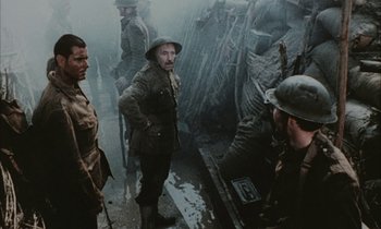 Movie still from “Johnny Got His Gun” (1971), directed by Dalton Trumbo – A group of men standing next to each other on a boat; Medium shot, Low angle