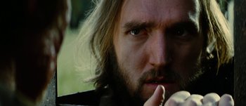 Movie still from “Jonah Hex” (2010), directed by Jimmy Hayward – A person with long hair and a beard; Close Up shot, Low angle