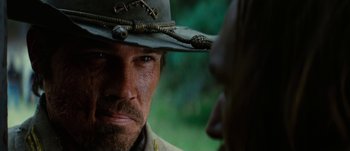 Movie still from “Jonah Hex” (2010), directed by Jimmy Hayward – A person wearing a hat; Close Up shot, Over the shoulder angle