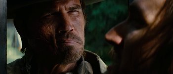 Movie still from “Jonah Hex” (2010), directed by Jimmy Hayward – A person with a beard; Close Up shot, Over the shoulder angle