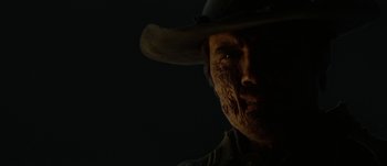 Movie still from “Jonah Hex” (2010), directed by Jimmy Hayward – A person wearing a cowboy hat; Close Up shot, Low angle