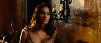 Movie still from “Jonah Hex” (2010), directed by Jimmy Hayward – A beautiful woman with long dark hair wearing a tiara; Close Up shot, Over the shoulder angle