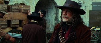 Movie still from “Jonah Hex” (2010), directed by Jimmy Hayward – A group of men standing next to each other on a street; Medium shot, Low angle