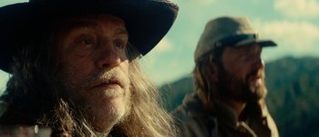 Movie still from “Jonah Hex” (2010), directed by Jimmy Hayward – A person wearing a hat; Close Up shot, Low angle