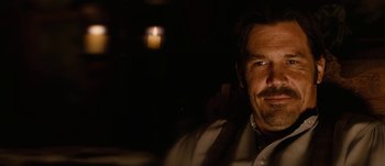 Movie still from “Jonah Hex” (2010), directed by Jimmy Hayward – A person wearing a suit and tie; Close Up shot, Over the shoulder angle