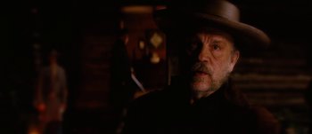 Movie still from “Jonah Hex” (2010), directed by Jimmy Hayward – A person wearing a cowboy hat; Close Up shot, Over the shoulder angle