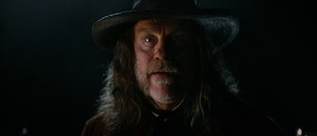 Movie still from “Jonah Hex” (2010), directed by Jimmy Hayward – A person wearing a hat; Close Up shot, Low angle